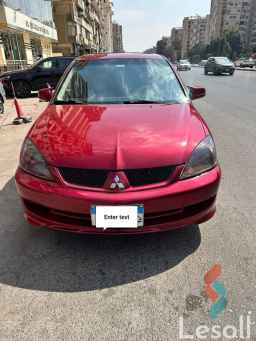 Mitsubishi lancer automatic used maroon model 2005
