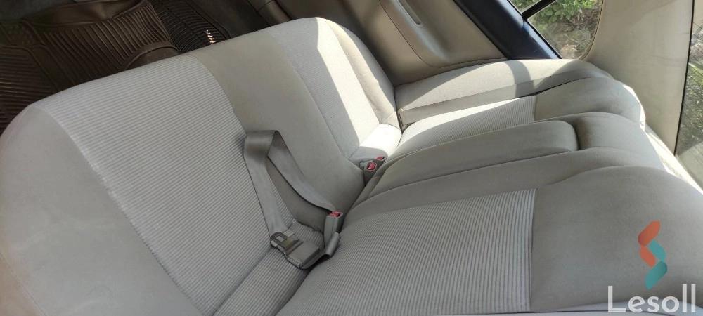 Mitsubishi lancer automatic used maroon model 2005