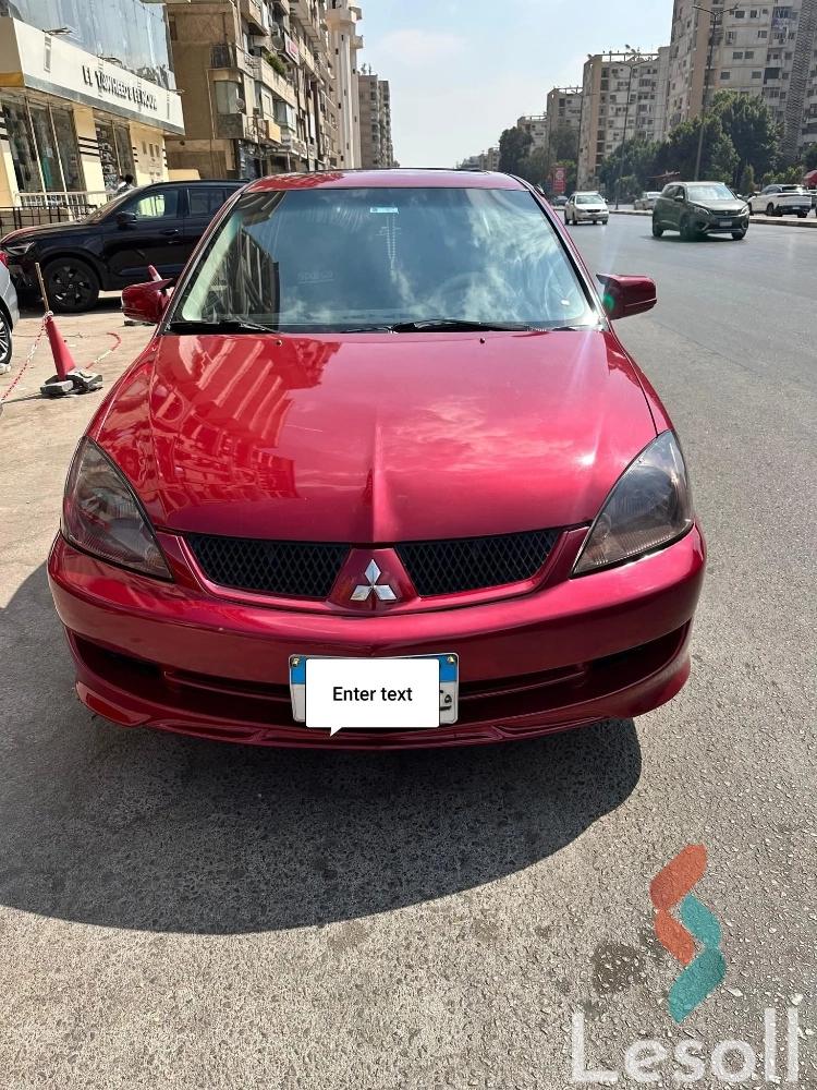 Mitsubishi lancer automatic used maroon model 2005