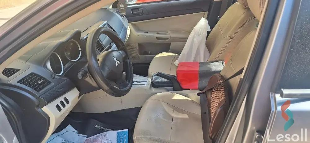 ميتسوبيشي لانسر اوتوماتك مستعملة رمادي داكن موديل 2015 - كل الصور