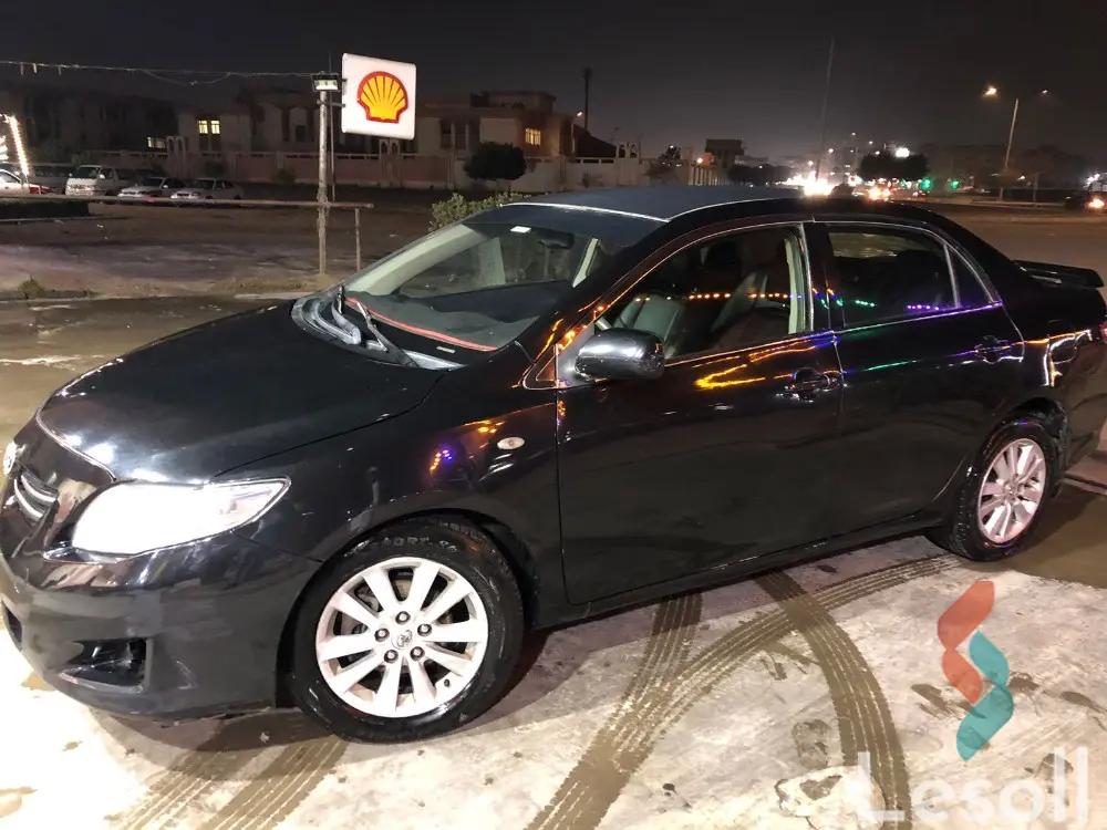 تويوتا كورولا اوتوماتك مستعملة أسود موديل 2009 - صورة 2