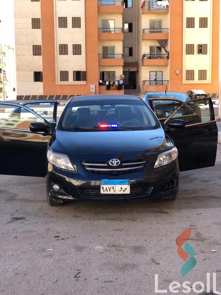 تويوتا كورولا اوتوماتك مستعملة أسود موديل 2009 - الصورة الرئيسية