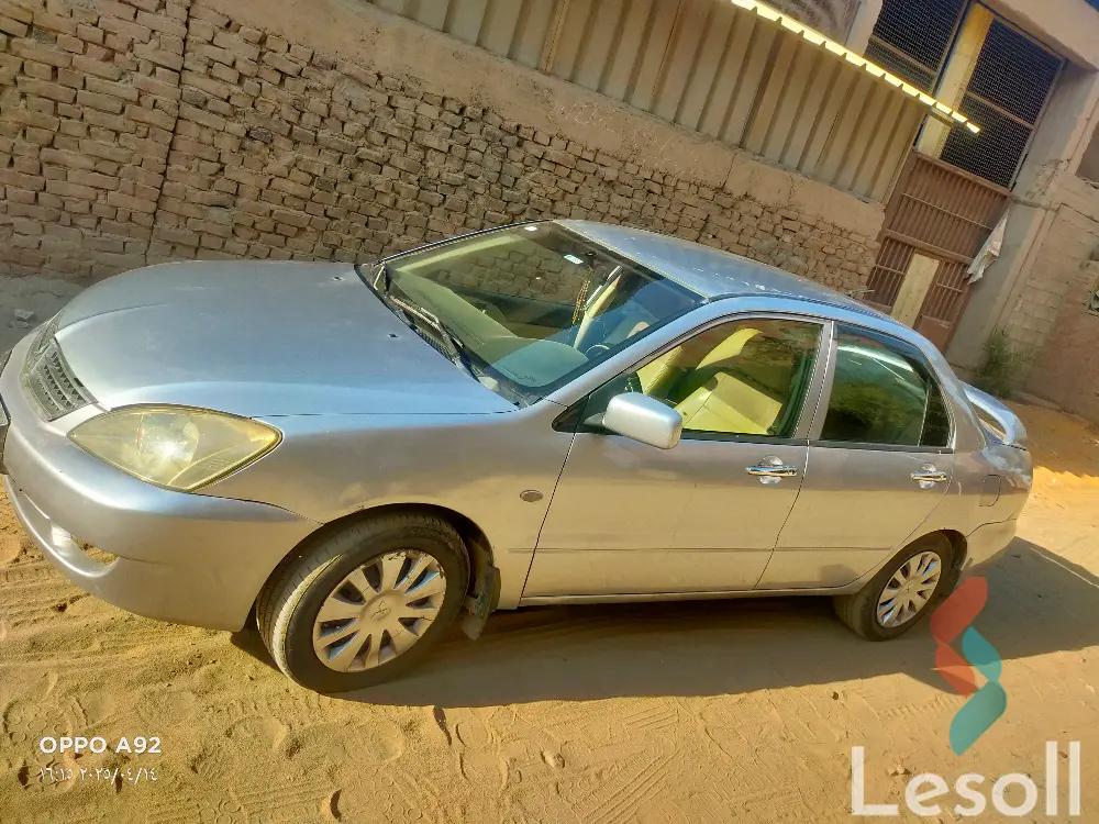 ميتسوبيشي لانسر مانيوال مستعملة فضي موديل 2008 - صورة 4