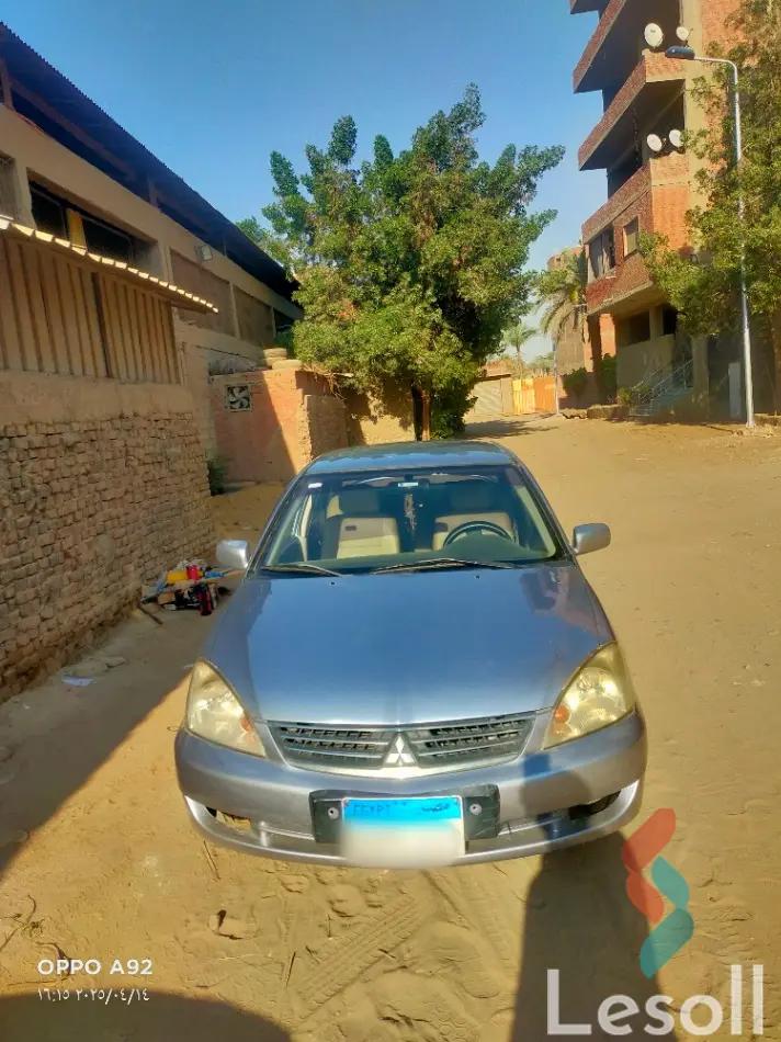 ميتسوبيشي لانسر مانيوال مستعملة فضي موديل 2008 - صورة 3