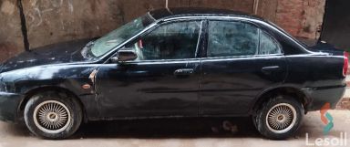 Mitsubishi lancer manual used black model 1999