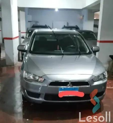 ميتسوبيشي لانسر اوتوماتك مستعملة رمادي داكن موديل 2014 - الصورة الرئيسية