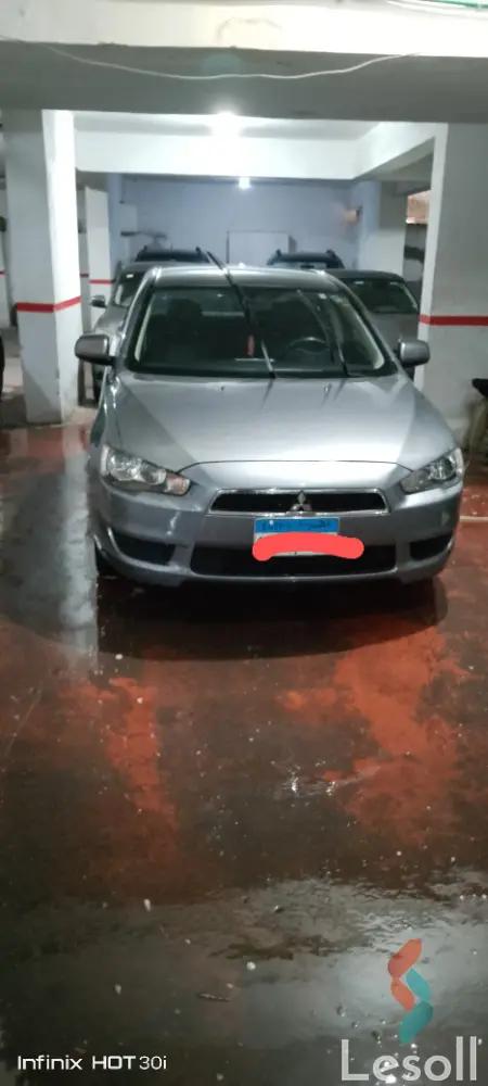 ميتسوبيشي لانسر اوتوماتك مستعملة رمادي داكن موديل 2014 - صورة 3