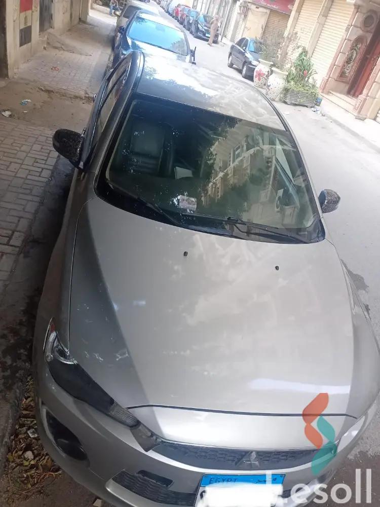 Mitsubishi lancer automatic used beige model 2017