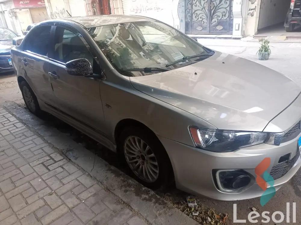 Mitsubishi lancer automatic used beige model 2017