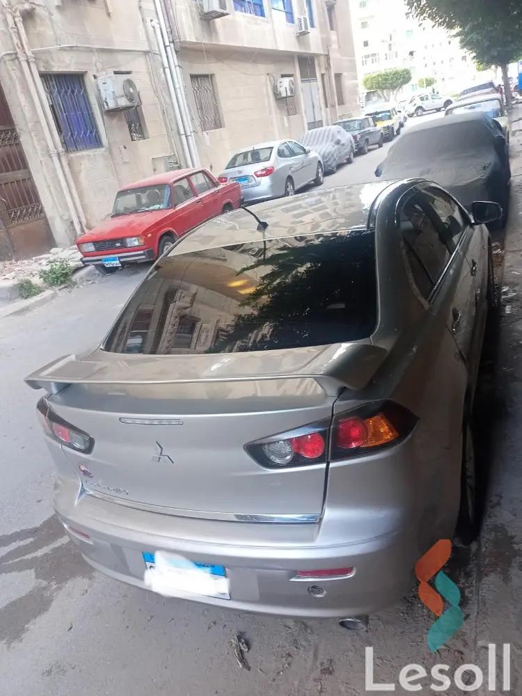 Mitsubishi lancer automatic used beige model 2017