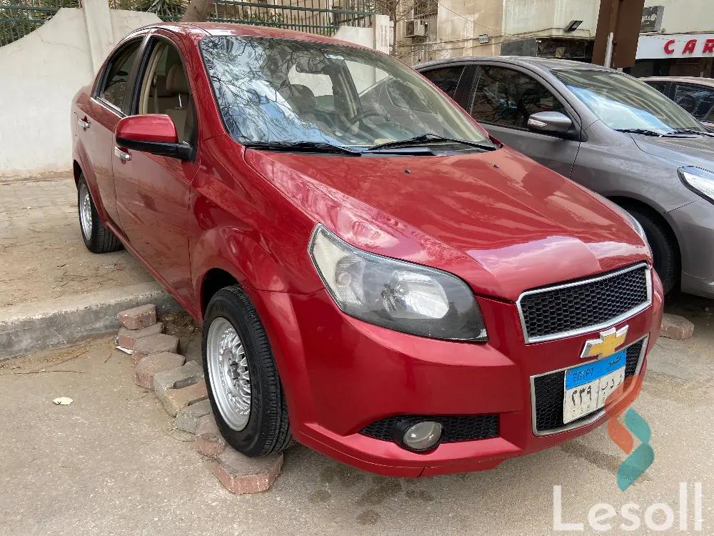 شيفروليه افيو اوتوماتك مستعملة أحمر موديل 2015 - صورة 3