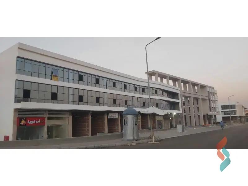 Retail for sale with an area of 56 meters in Hadayek October Giza - All Images