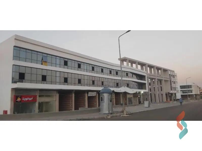 Retail for sale with an area of 56 meters in Hadayek October Giza - All Images