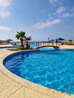 شالية للبيع ١٧٠م بحديقة ١٥٠م قرية كورال هيبز