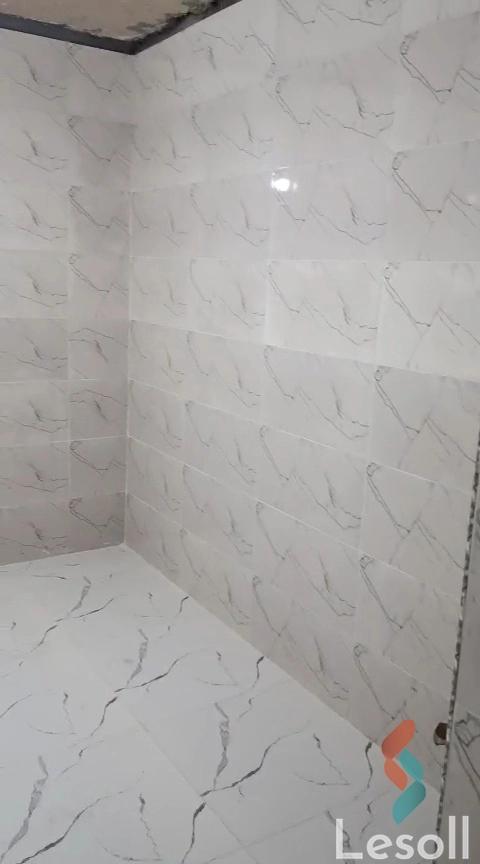 Shop for monthly rent with an area 12 meters in Warraq Giza