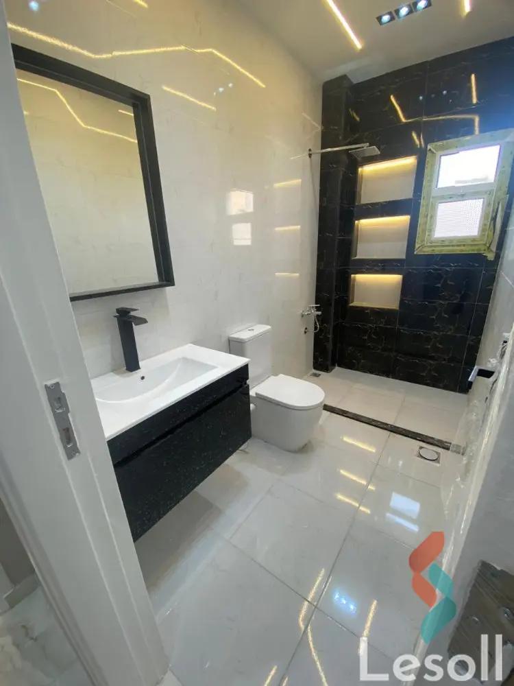 Apartment with garden for sale with an area 190 meters and 4 rooms in New Cairo - 5th Settlement Cairo