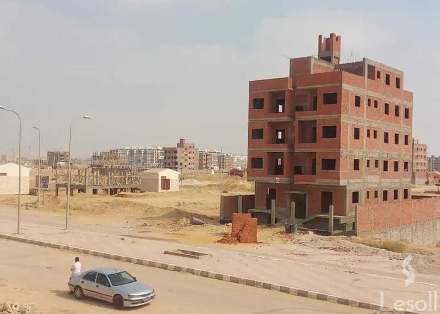 Land building for sale with an area of 100 meters in Helwan Cairo